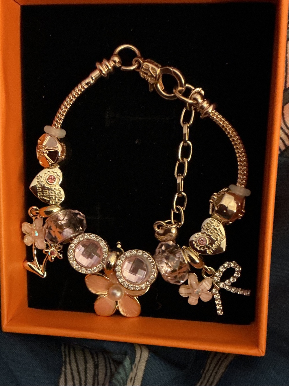 Gold-Tone Pink Crystal Charm Bracelet - Floral & Bow Accents